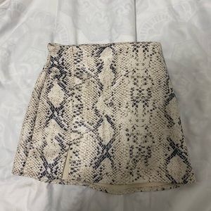 Snake skin bershka mini skirt with slit size small